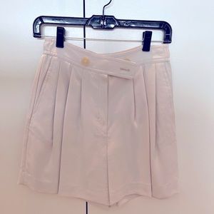 Aritzia Babaton cream high waisted pleated shorts